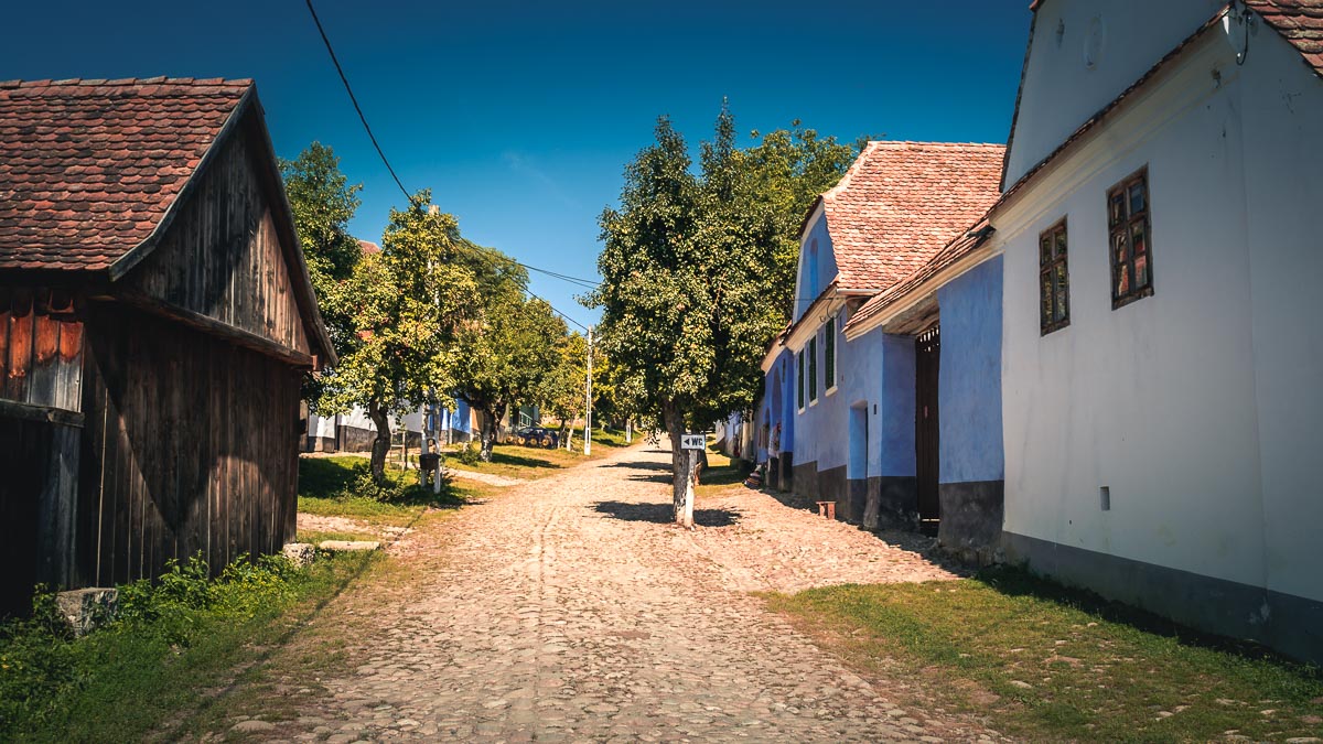 Paved street which leads to the Fortified Church in Viscri.