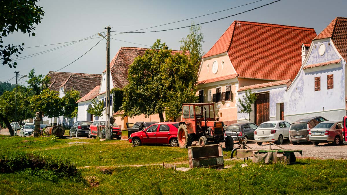 Well maintained houses with a lot of tourist cars.