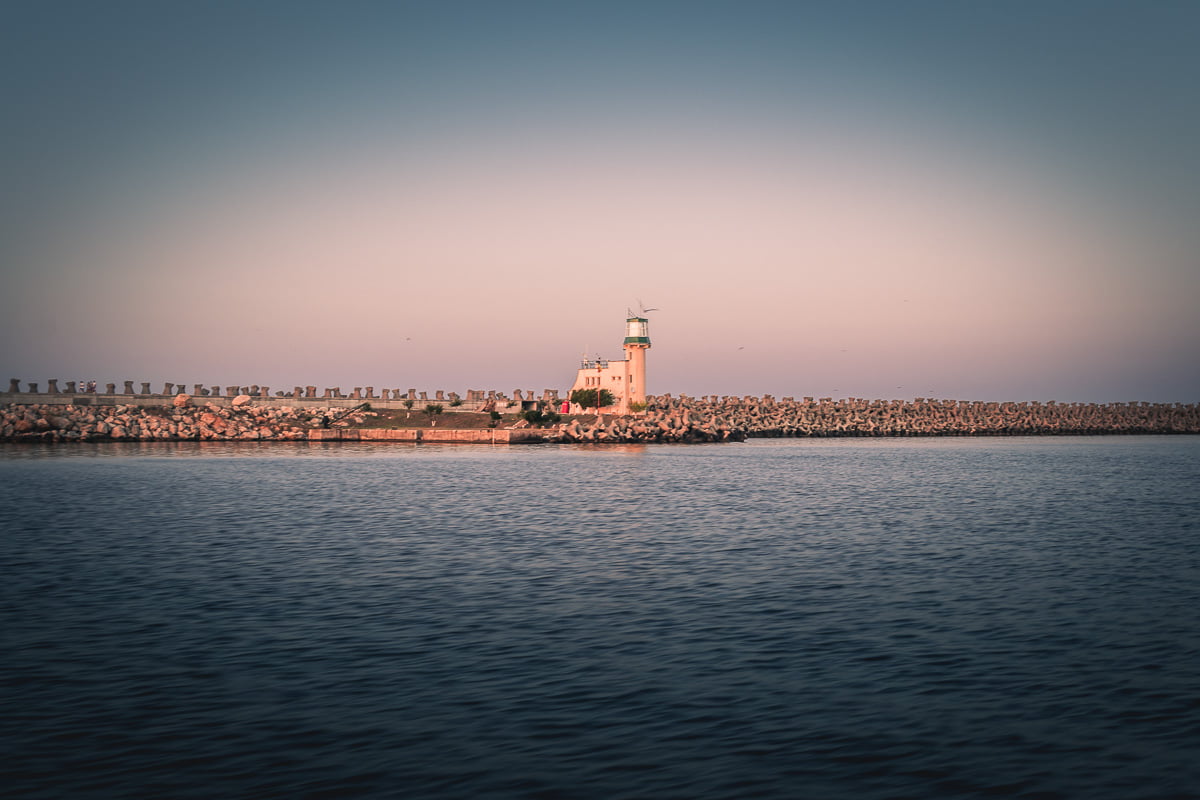 Lighthouse in Mangalia during sunset.