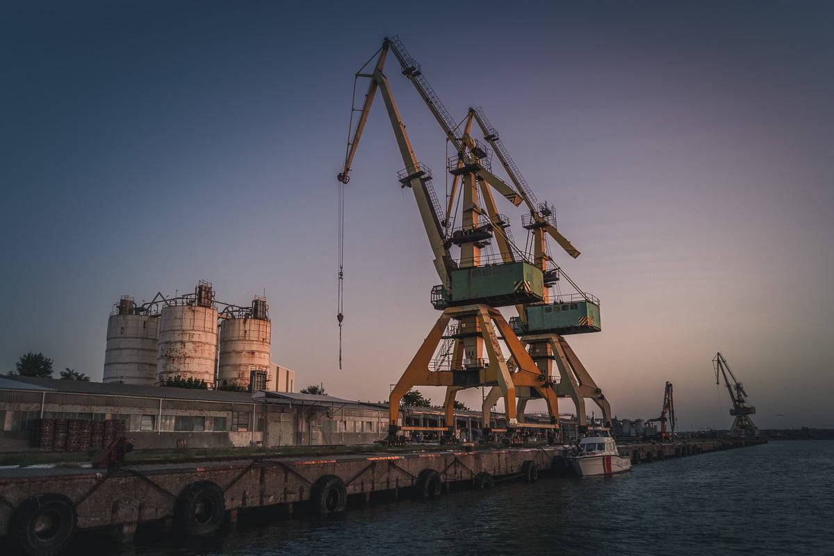 Large port cranes in the port.