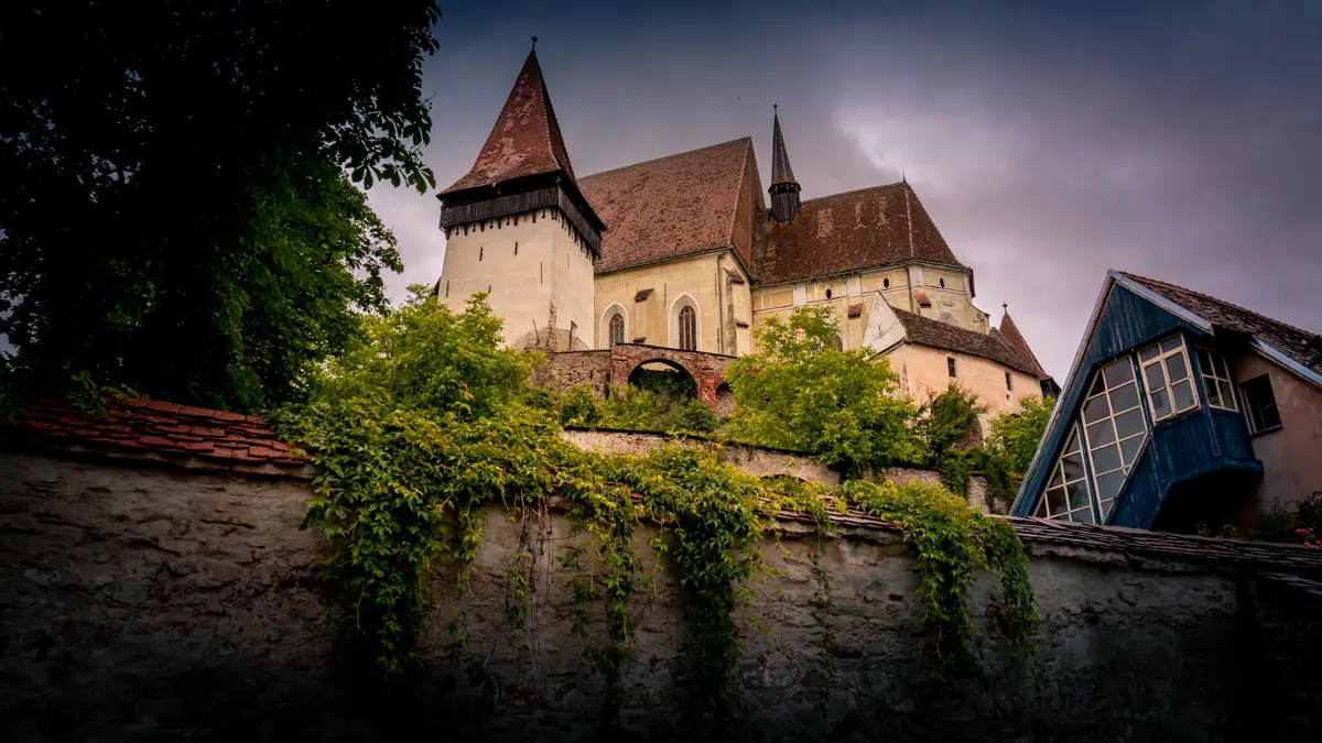 The fortification walls which surrounds the church.