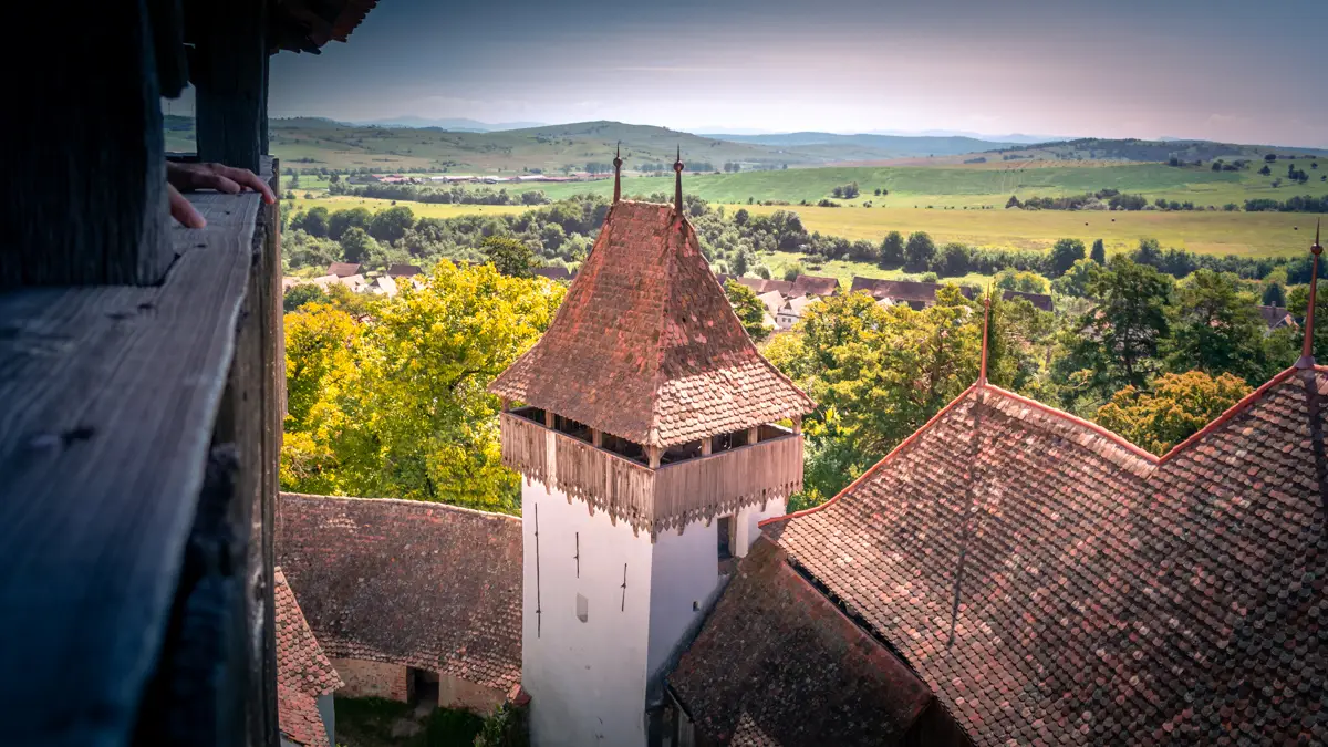 Another shot of the defense tower with the Transylvanian landscape in the background.