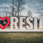 I love Resita sign next to the steam locomotive museum.