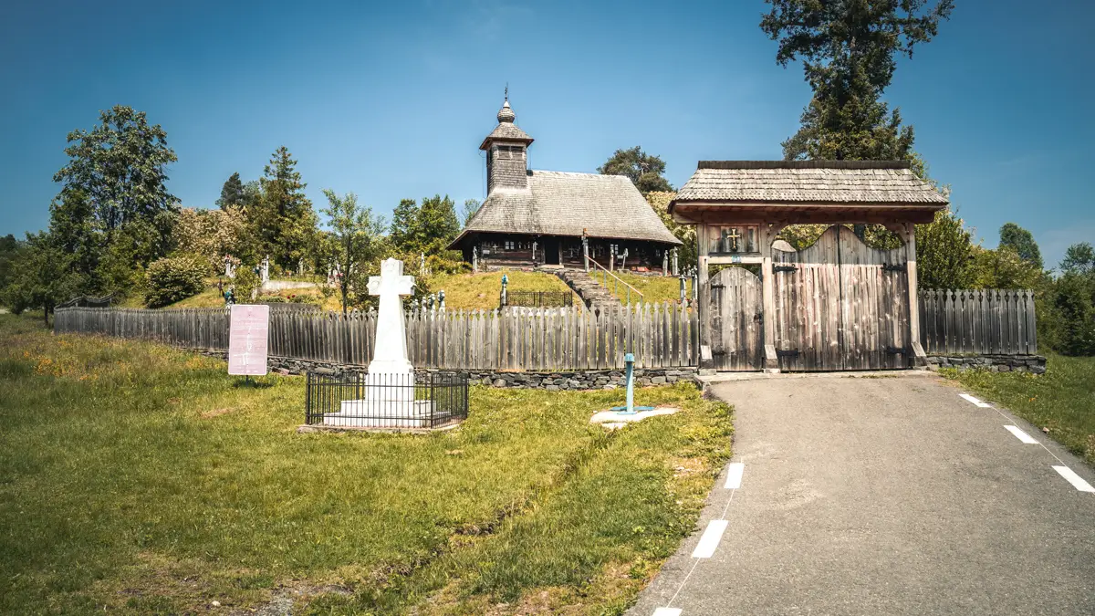 The cemetery and the wooden church.