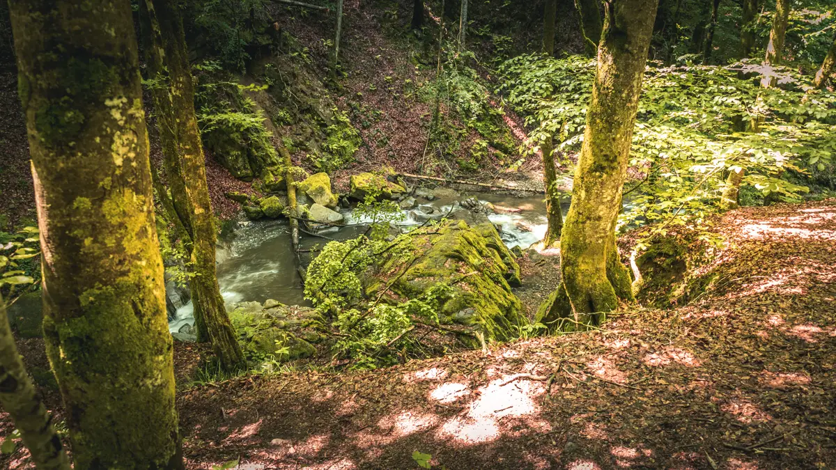 Large rocks near the stream feeding the Cornet waterfall.