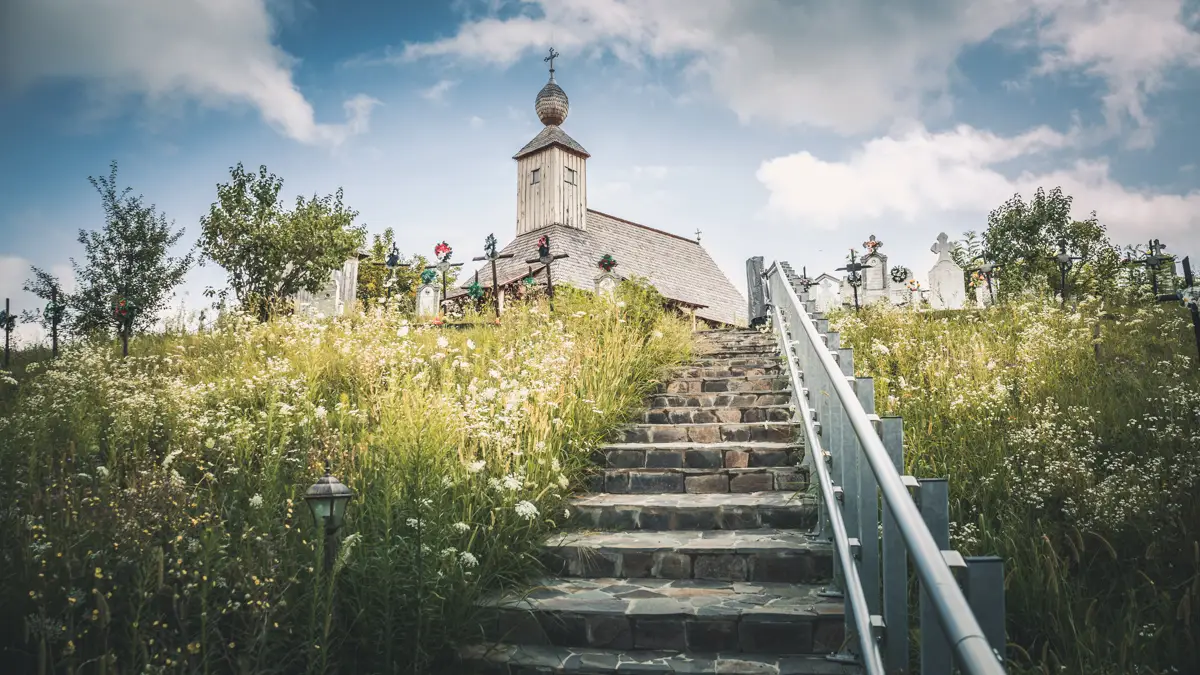 Stairs leading to the wooden church.