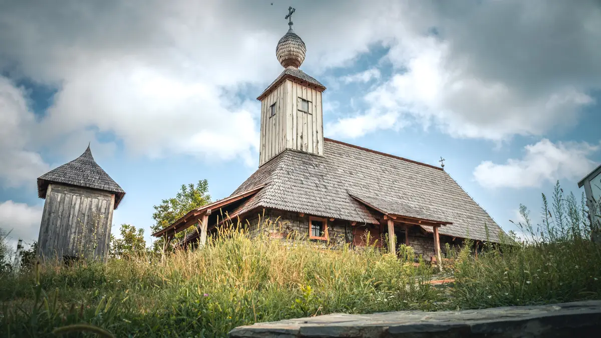 The belfry and the Nativity Of Saint John The Baptist church.